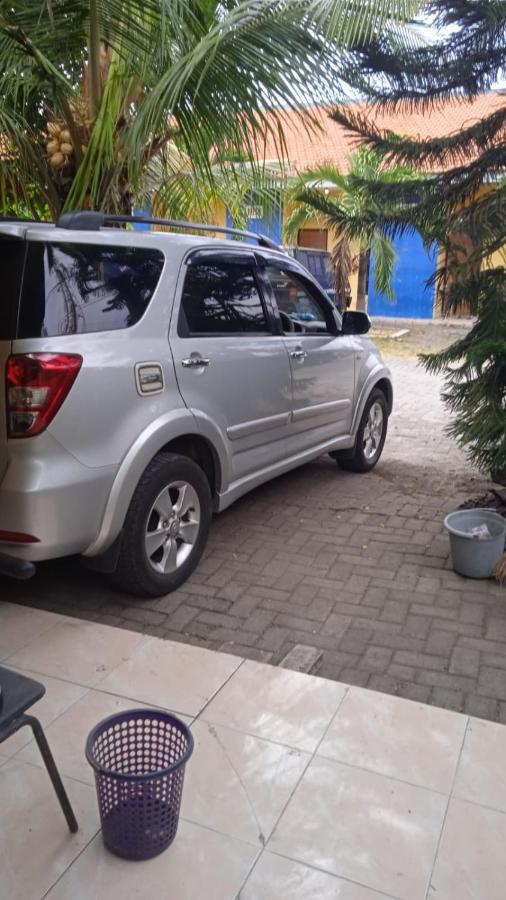 Kost Backpacker Hotel Sidoarjo Buitenkant foto